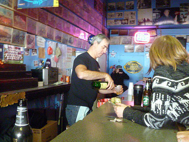 Owner Michael Sarrel pours himself a shot of Jameson. When his daughter Cara reminded him of the no-drinking-behind-the-bar rule, he replied, "Yeah, I broke my own rules. I'm allowed today."